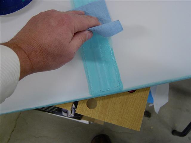 Wipe off excess glue for tapes.